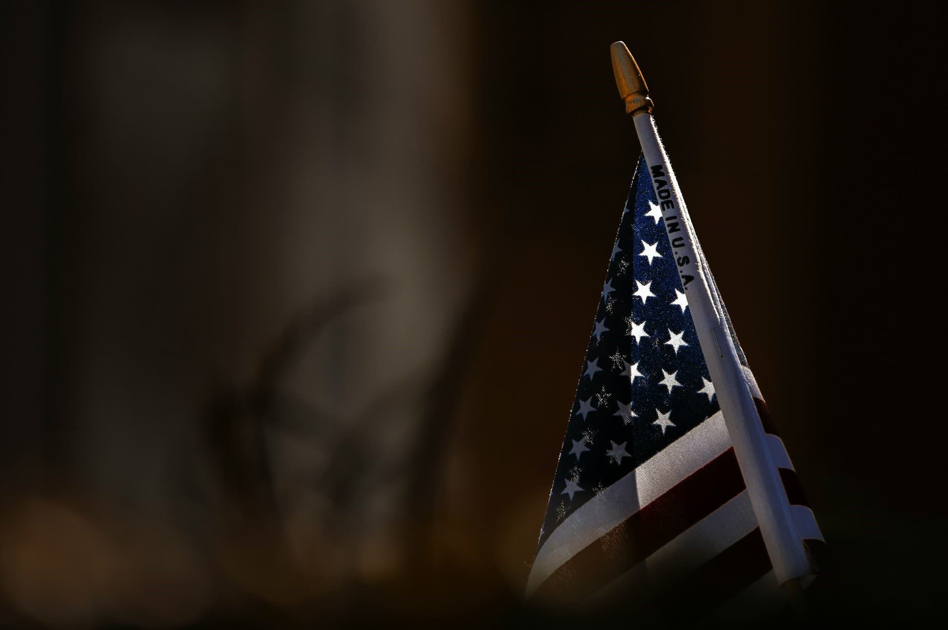 American flag in shadow.