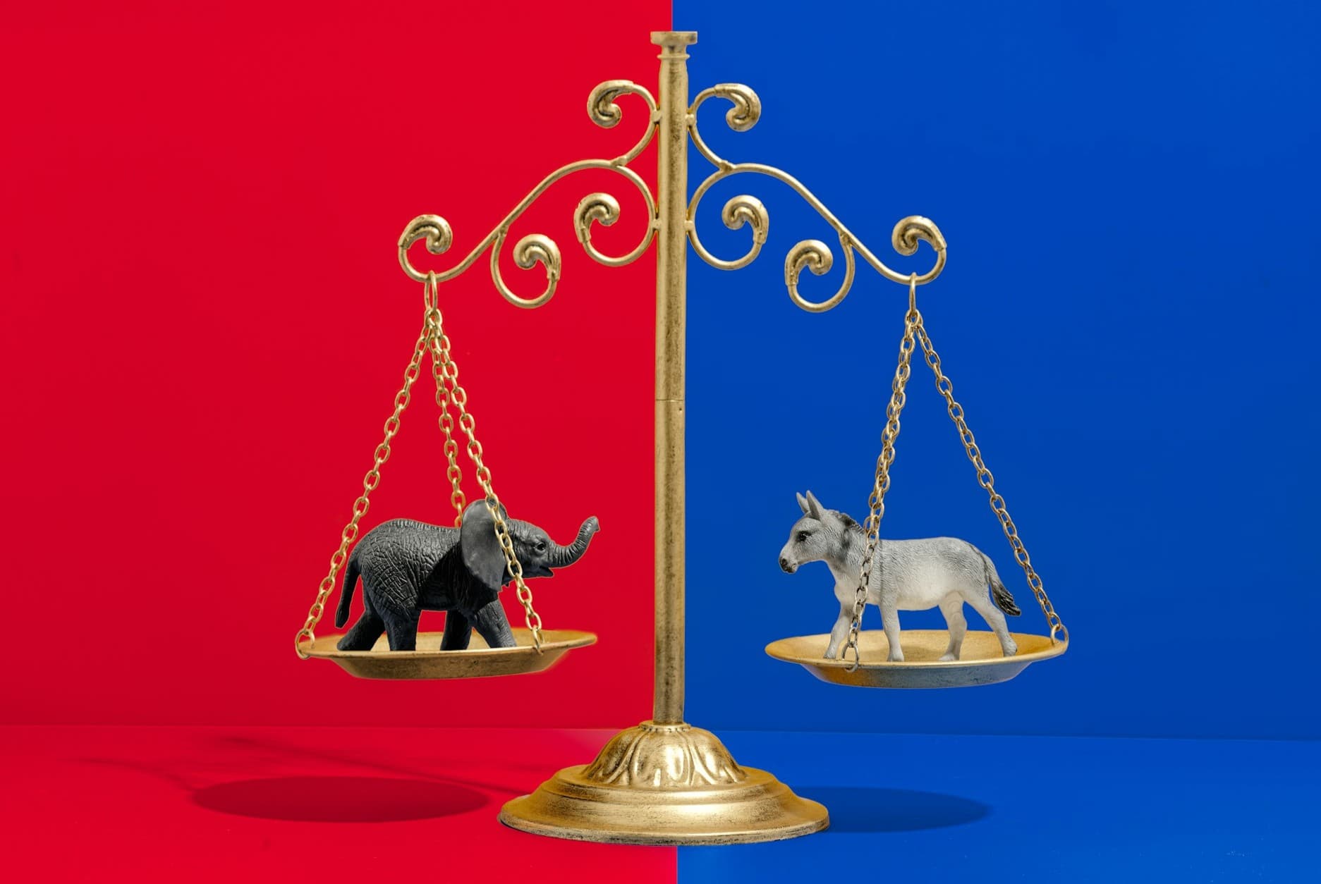 Symbols of both parties on a scale. 